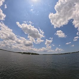 clouds in the sky over a body of water