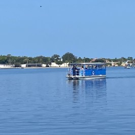 a boat in the middle of a body of water